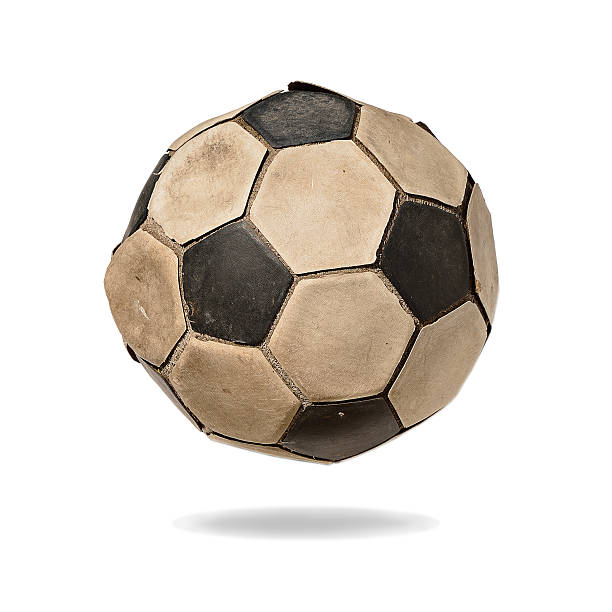 istock Dirty soccer ball isolated on white background 517863612