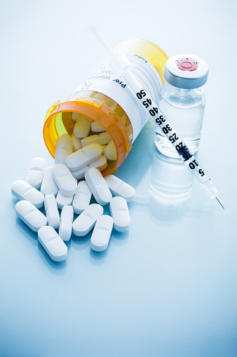 Syringe and Pills