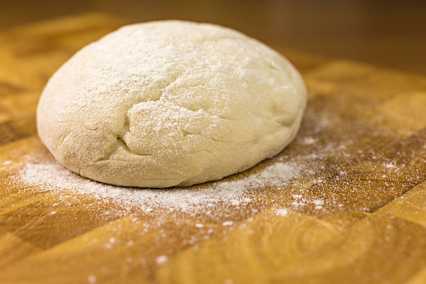 istock ball of pizza dough 517864326