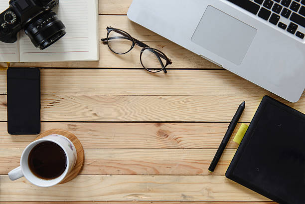 istock Working table of photographer or artist overhead view 517866510