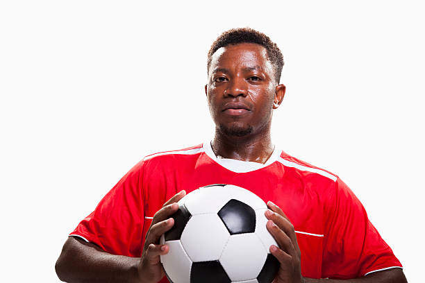 istock Athlete with soccer ball 517866702
