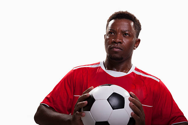 istock Athlete with soccer ball 517866854