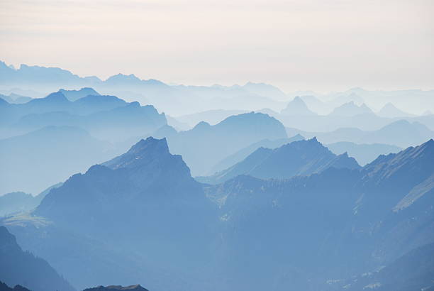 istock Mountain view in the mist Swiss alps 517866858