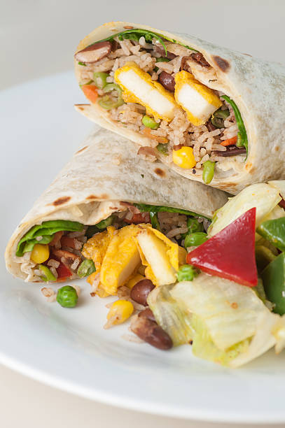 istock Paneer cheese vegetarian roll or twister in chapati 517866976