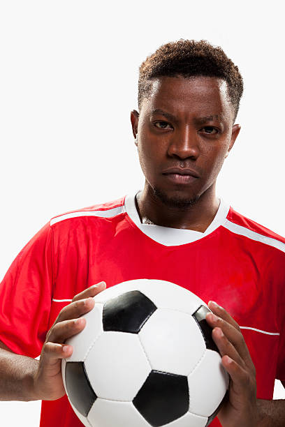 istock Athlete with soccer ball 517868112