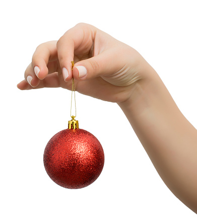 Giving a red christmas bauble