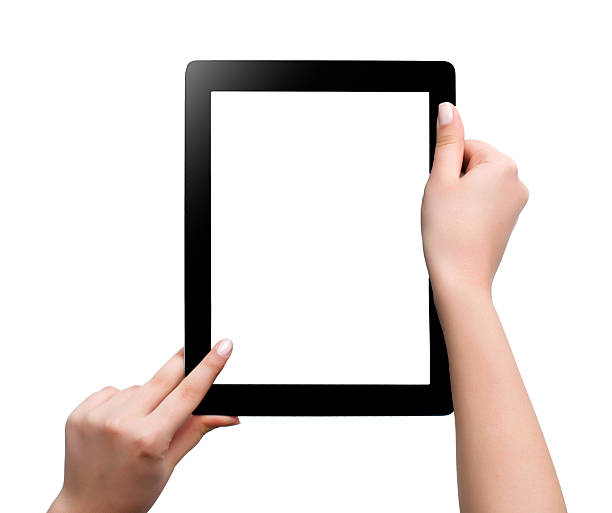 istock female teen hands using tablet pc with white screen, isolated 517869458