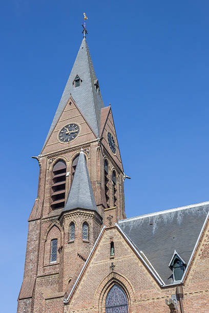 istock Tower of the Willibrorduskerk in Sappemeer 517869580