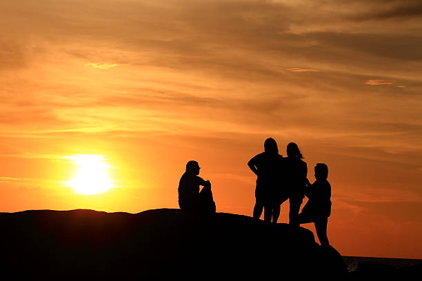 istock Silhouette people the evening sunset. 517869993