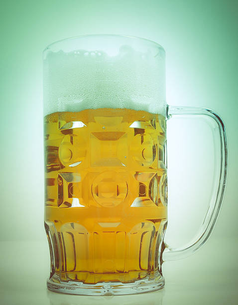 Retro look Lager beer glass Vintage looking A large glass of German lager beer large german beer steins stock pictures, royalty-free photos & images
