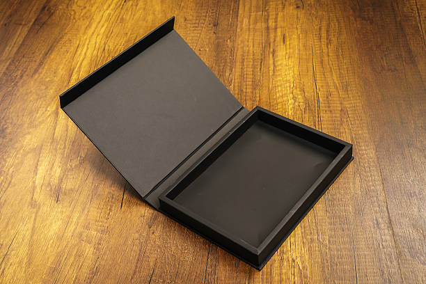 istock Blank black box mock up on wood background 517870714