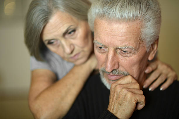 istock Mature couple near wall 517871918