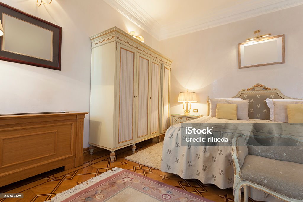 Interior of a classic style hotel room Bed - Furniture Stock Photo