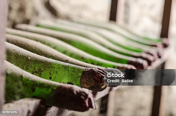 Old Dusty Wine Bottles In Cellar Stock Photo - Download Image Now - Top Secret - Single Word, Aging Process, Alcohol - Drink