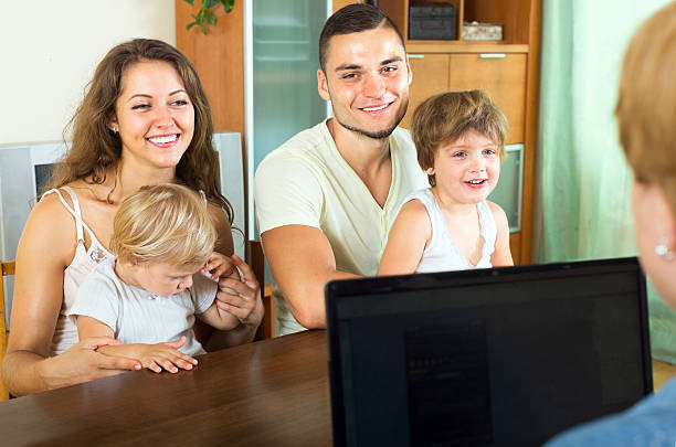 istock parents with little kids 517873907