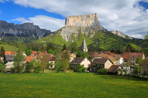 Mont Aiguille and the village of Chichilianne in the Vercors natural park (France).