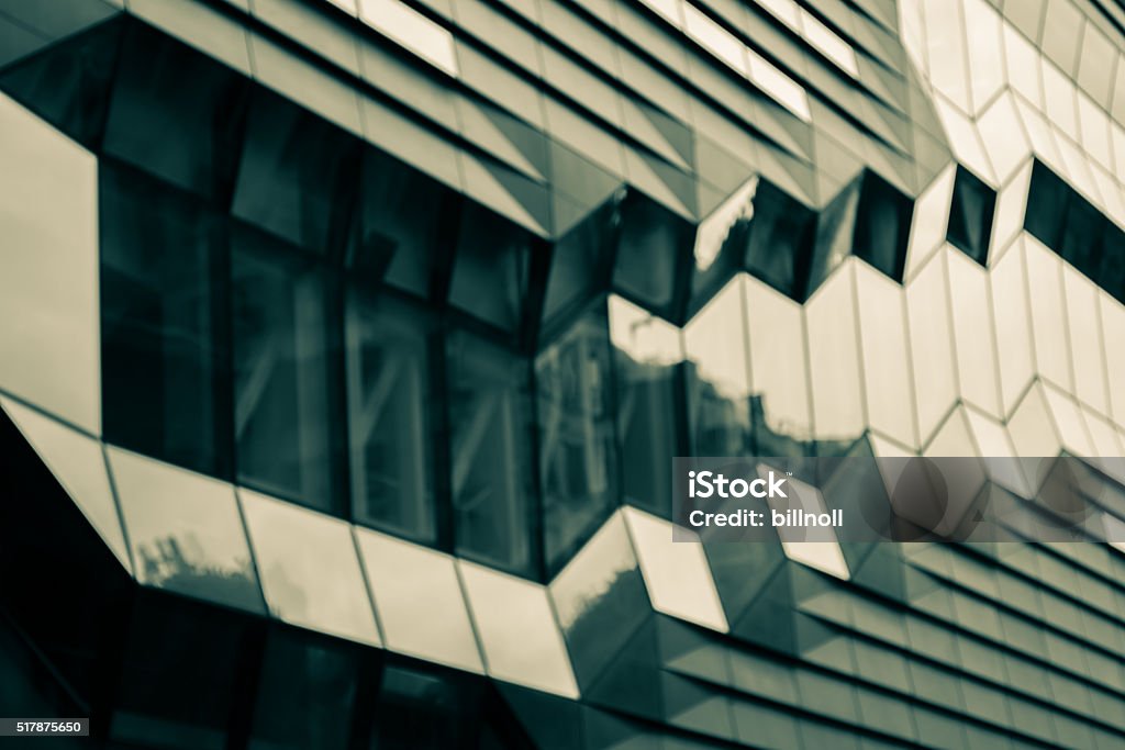 Cool toned architectural exterior detail Cool toned monochrome architectural exterior detail image. Tilt shift lens for selective blur and effect. Steel Stock Photo