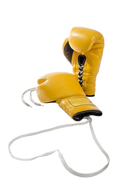 paio di guanti da boxe gialli isolato su sfondo bianco - group of objects padding exercising boxing glove foto e immagini stock