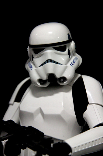 Vancouver, Canada - August 17, 2015: An Imperial Stormtrooper action figure from the Star Wars film franchise posed on black. 