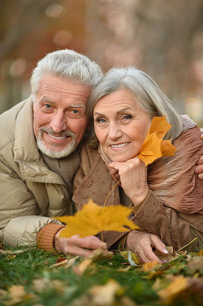 istock Senior couple in autumn park 517877138