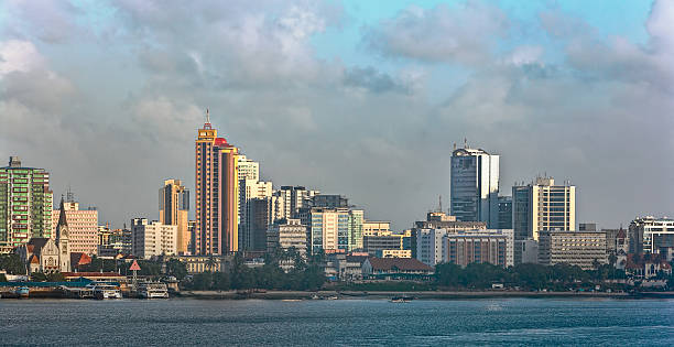 Sunset panorama of Dar Es Salaam City Centre Sunset panorama of Dar Es Salaam City Centre with waterfront and ships stitched image stock pictures, royalty-free photos & images