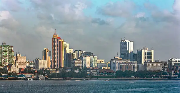 Sunset panorama of Dar Es Salaam City Centre with waterfront and ships