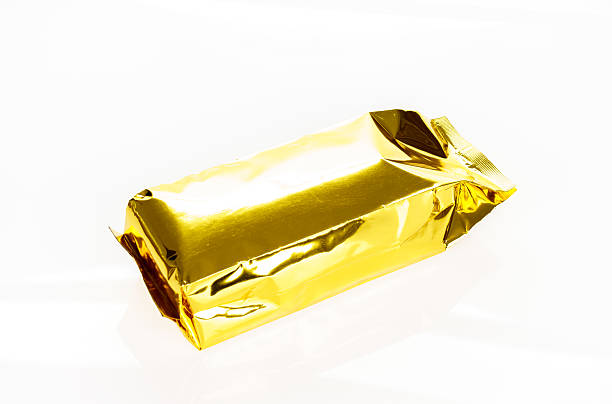 istock Golden foil bag package on white background 517877380