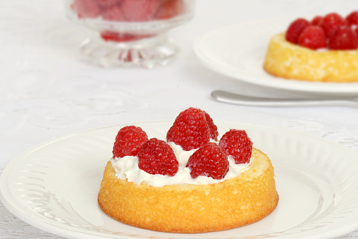 macro raspberry shortcake on a plate 