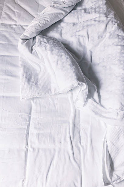 istock Top view of bedding sheets and pillow 517877468