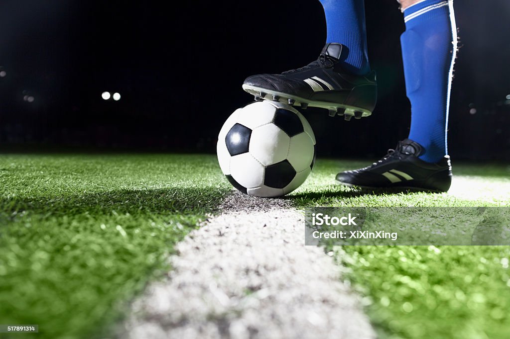 Foot on soccer ball Soccer Stock Photo