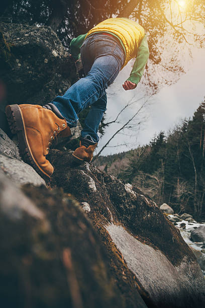 istock On a walk. Hiker walking in a forest. 517892796