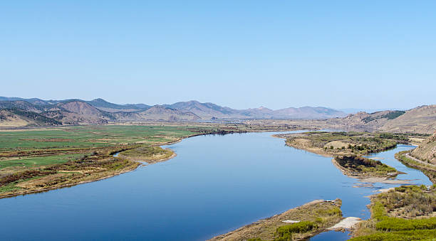 istock Siberian river in the mountains and hills 517893804