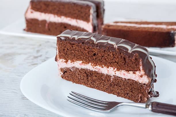 istock Chocolate cake with strawberry filling 517894706