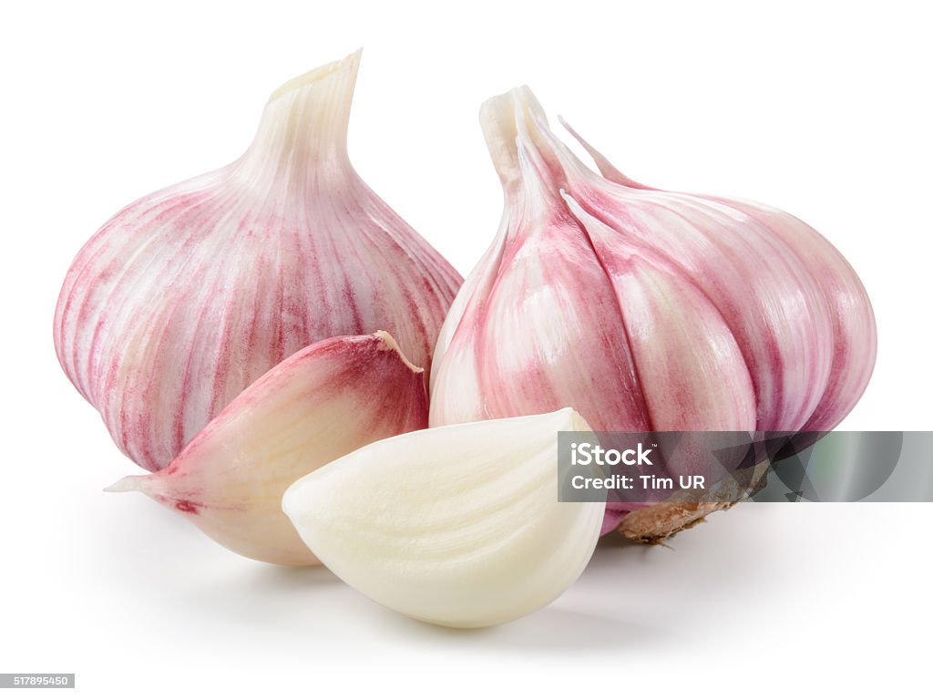 Garlic closeup isolated on white background. With clipping path. Garlic Stock Photo
