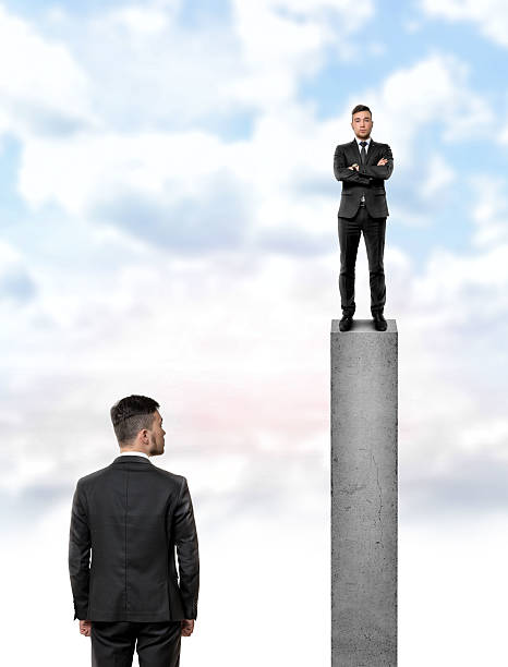 istock Back view businessman looking at other man standing on the 517897590