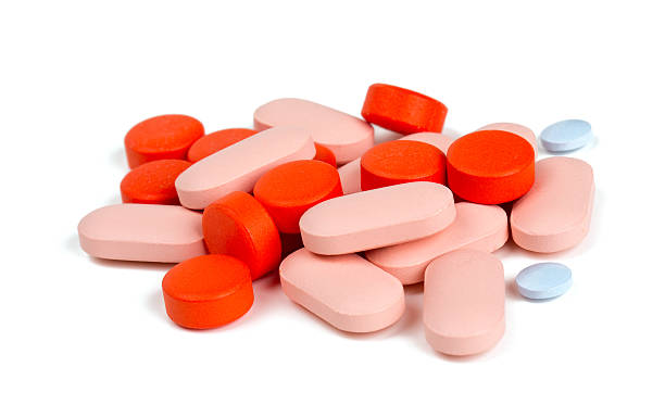 istock pile of different pills isolated on white 517898156