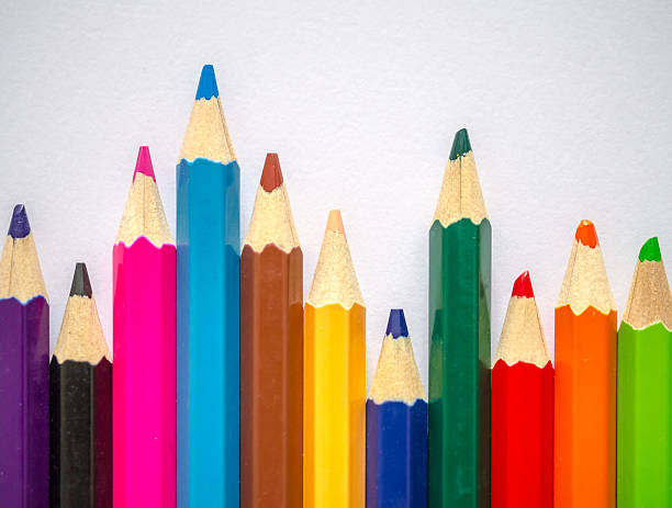 istock Colored pencil isolated on grey art paper 517898377