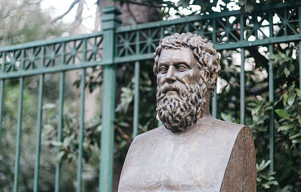 A Roman or Greek bust sits in a yard in Kamakura, Japan