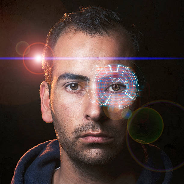 Futuristic young man with a hologram in one eye