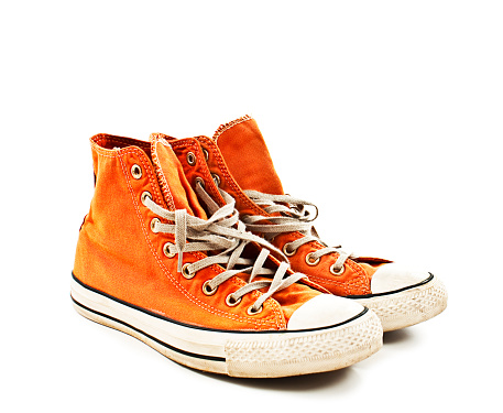 Vintage orange shoes. Isolated on white background