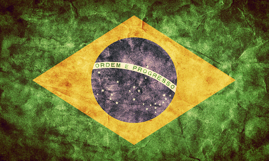 Brazilian national flag on highly figured cloth.