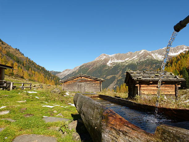 istock Drinking water wells in the Alps 517901028