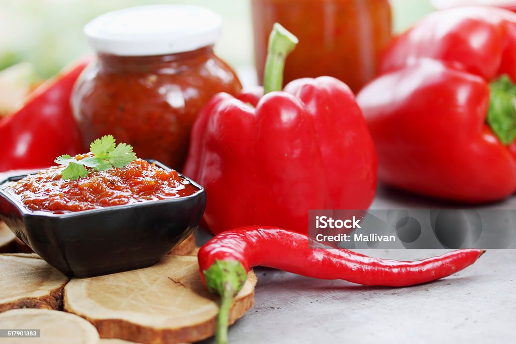 spicy chutney chutney from red sweet pepper with the addition of spices Bowl Stock Photo