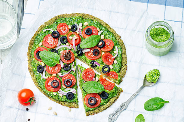 istock vegan broccoli zucchini pizza crust with vegetables 517902842