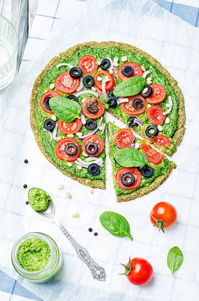 istock vegan broccoli zucchini pizza crust with vegetables 517902848