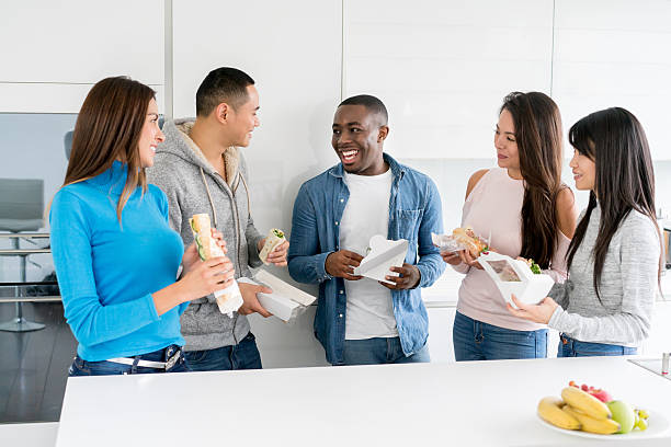 istock Group of friends at a dinner party 517906118