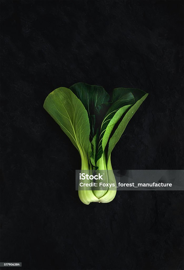 Pak choi on slate stone black background, top view Asia Stock Photo