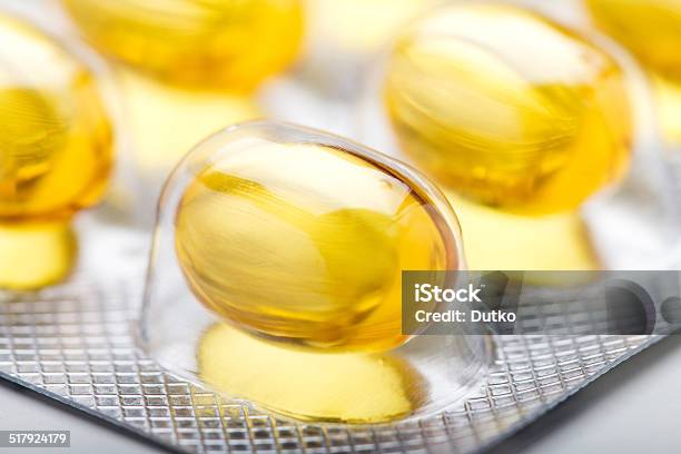 Fish Oil Capsules Closeup Stock Photo - Download Image Now - Acid, Alternative Therapy, Animal Digestive System