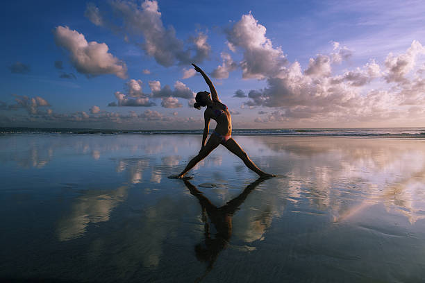 istock Yoga Woman at Sunset 517925137