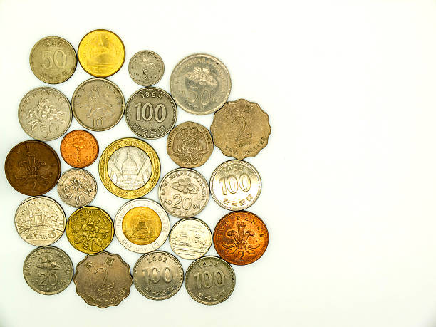 istock International old coin on white background 517925216